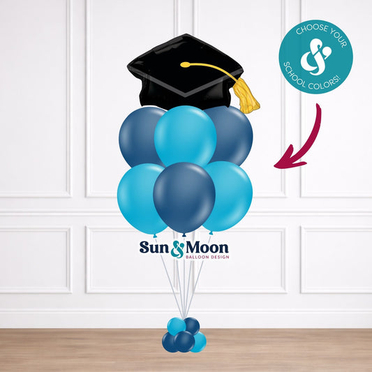 Graduation-themed balloon set with black cap and custom school color balloons