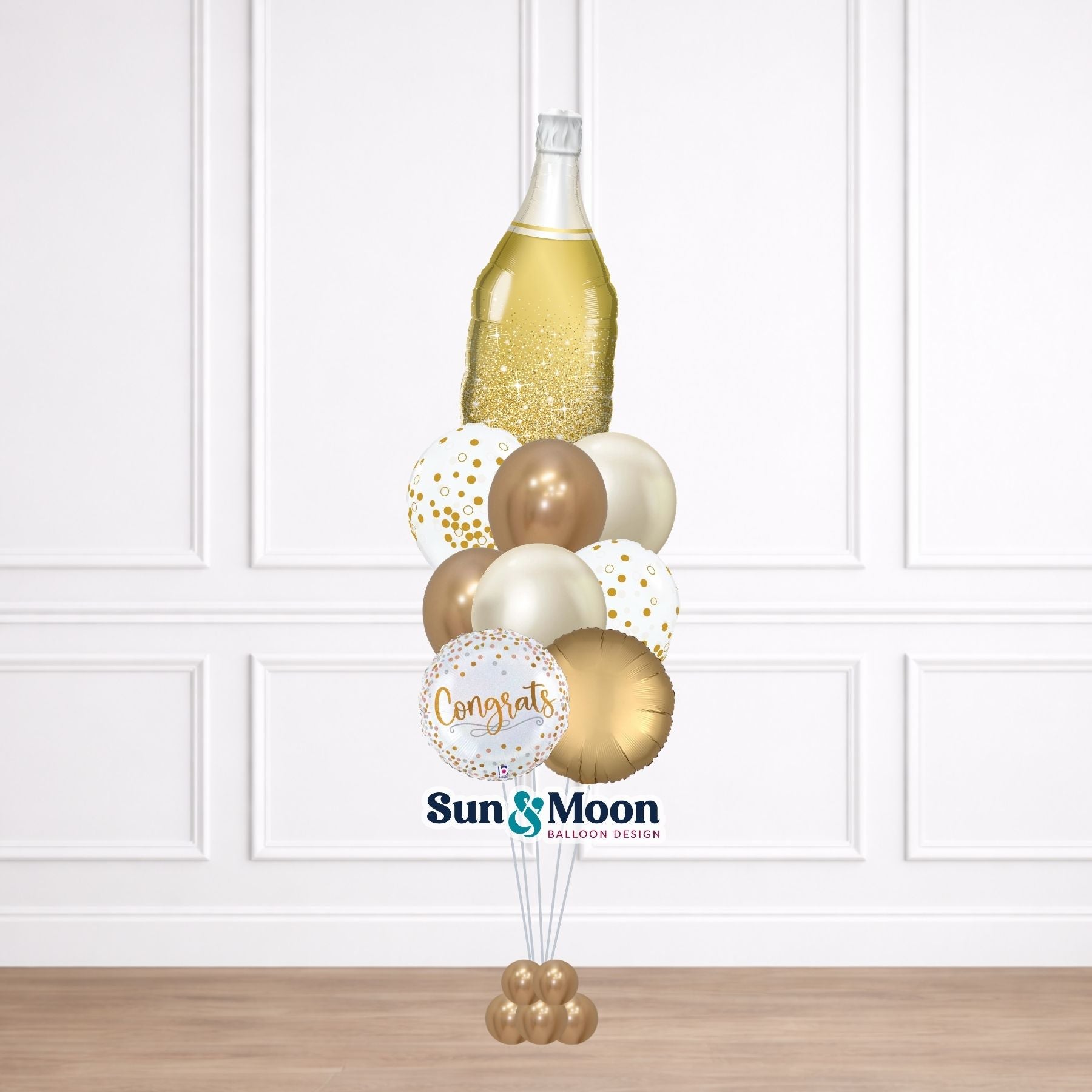 Toast themed balloon bouquet with champagne colors New Market Maryland